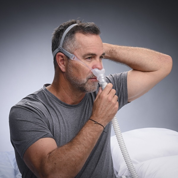 Man Fitting Delta Wave CPAP Mask